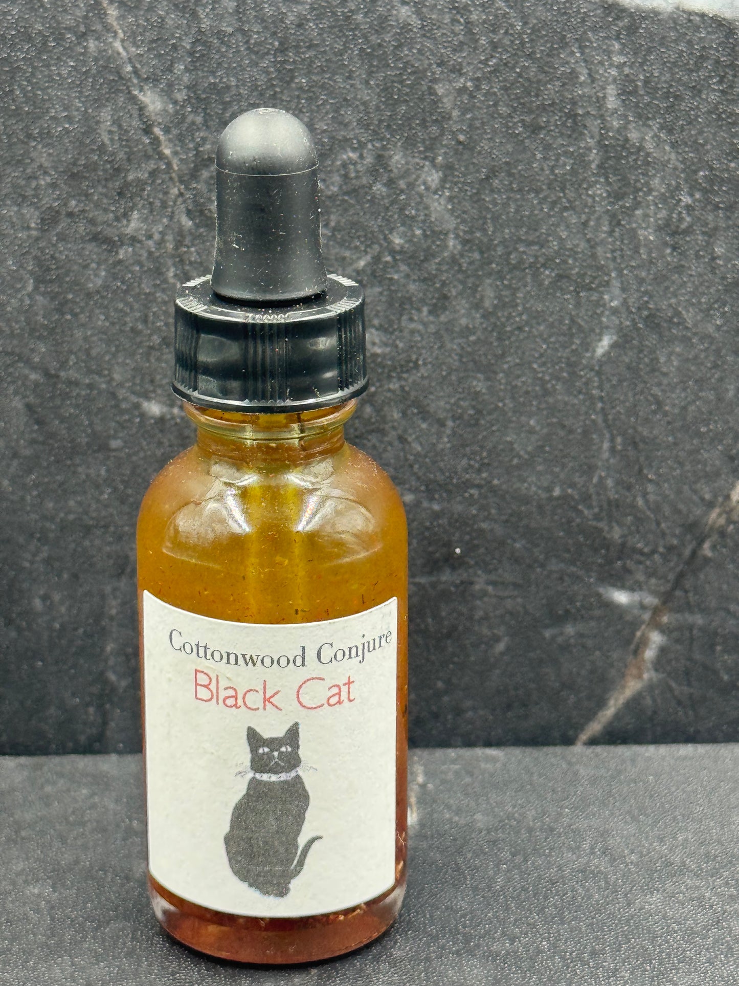 Black cat oil